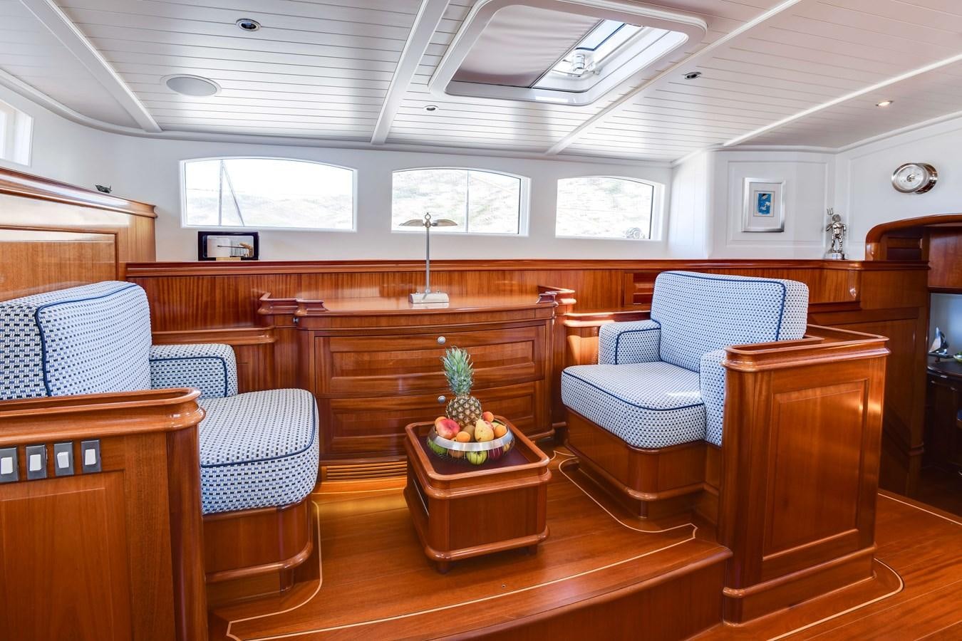 a room with a piano and a piano aboard ATALANTE Yacht for Sale