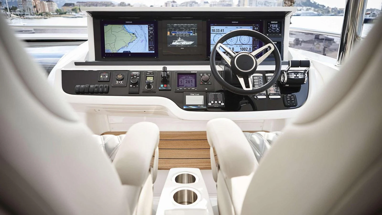 a person driving a car aboard GHOST Yacht for Sale