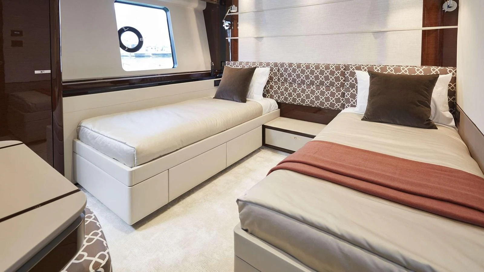 a room with a bed and a window aboard GHOST Yacht for Sale