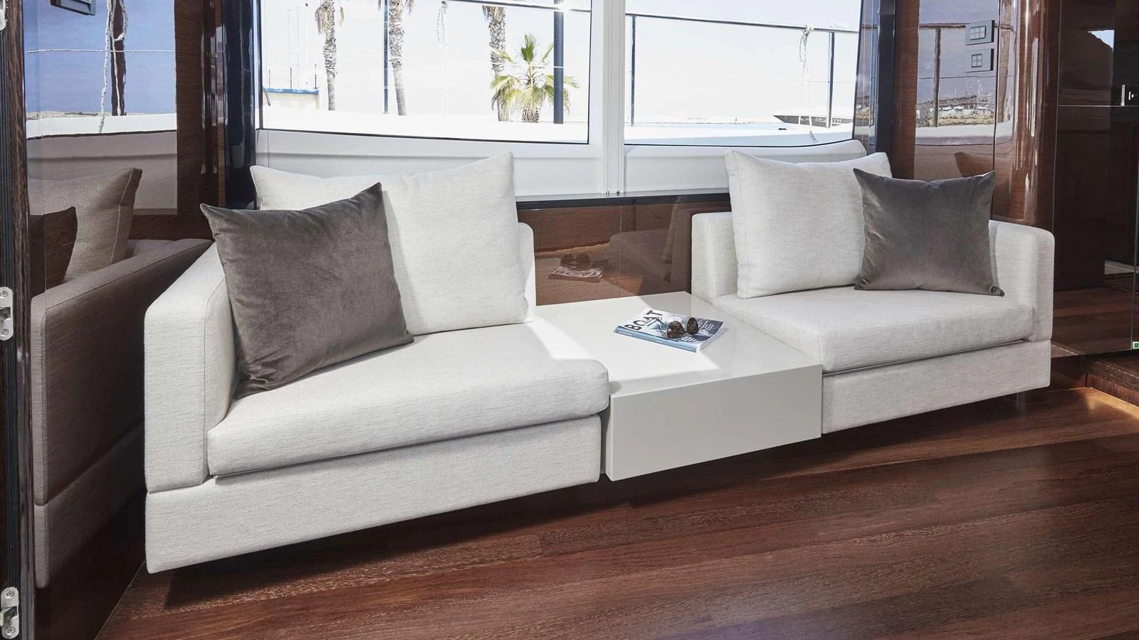 a couch with pillows aboard GHOST Yacht for Sale