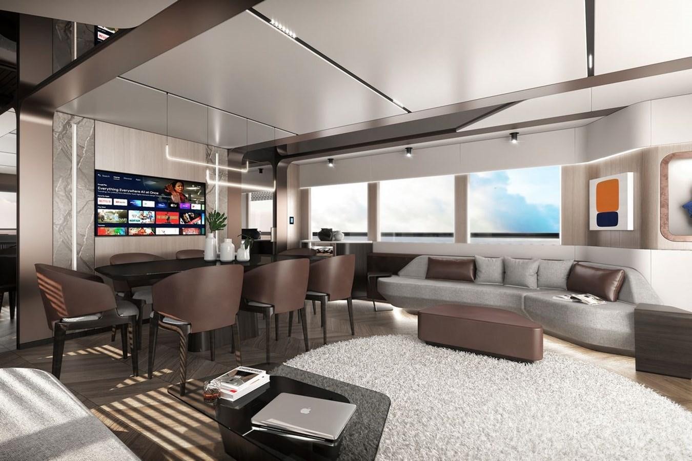 a living room with a large screen aboard KANDO 85 Yacht for Sale