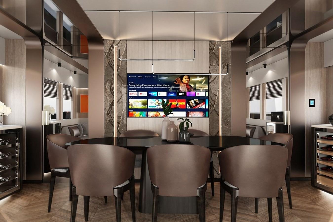 a room with a table and chairs aboard KANDO 85 Yacht for Sale