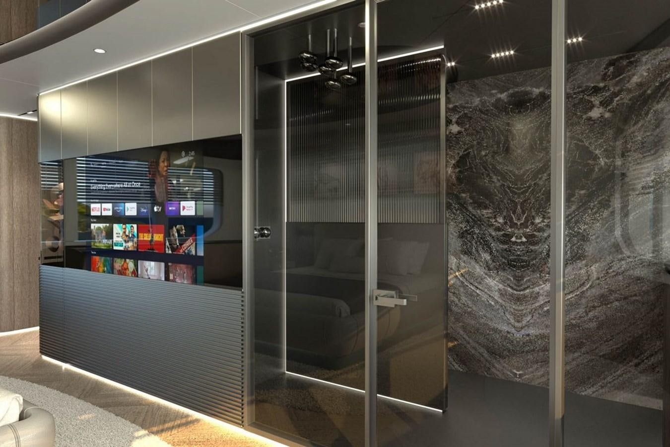 a room with a large glass wall aboard KANDO 85 Yacht for Sale