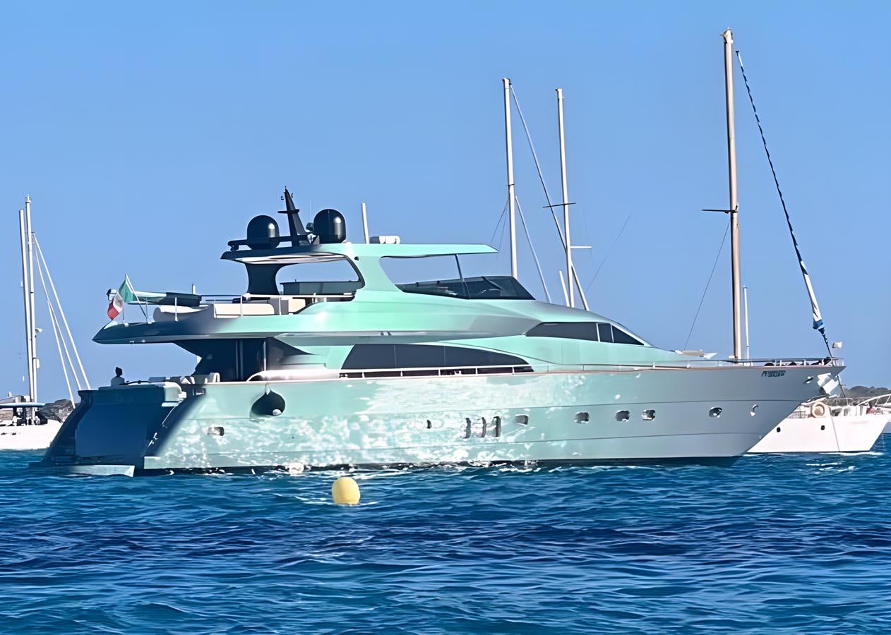 a white yacht in the water aboard UNICA Yacht for Sale