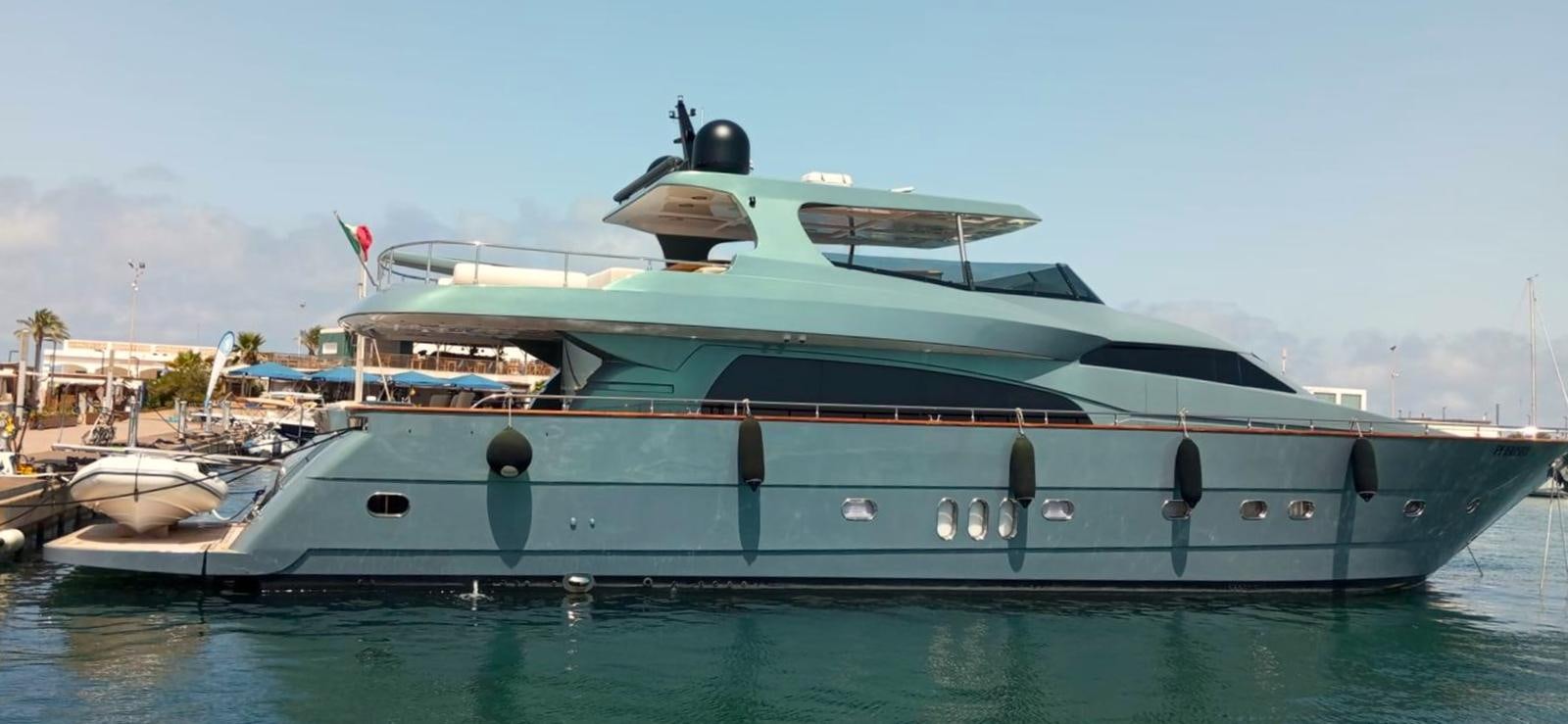 a large boat in a body of water aboard UNICA Yacht for Sale