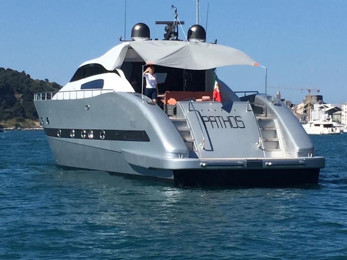 a person standing on a boat aboard PATHOS Yacht for Sale