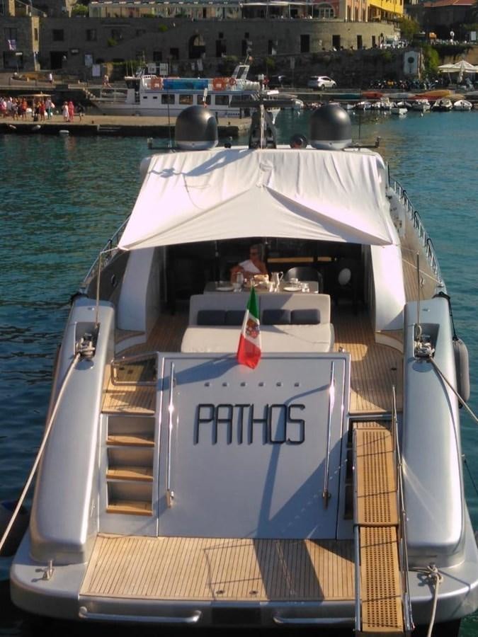 a boat with a person on it aboard PATHOS Yacht for Sale