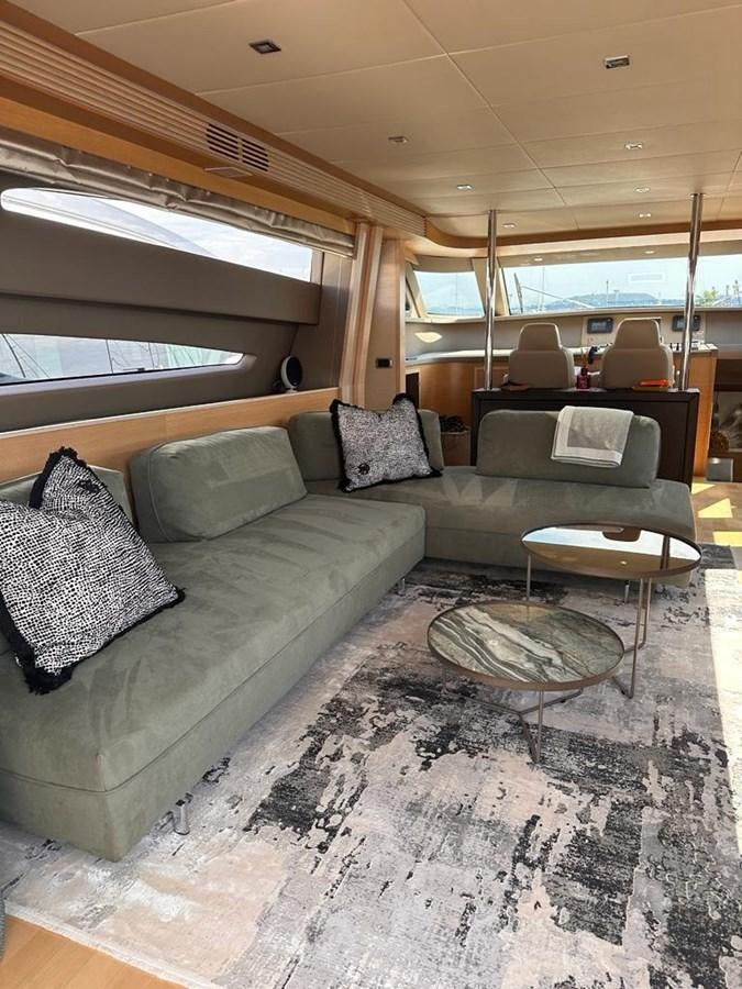a couch in a room aboard PATHOS Yacht for Sale