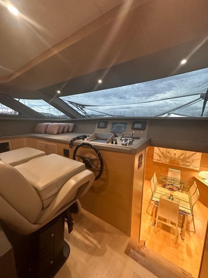a room with a bed and a desk aboard PATHOS Yacht for Sale