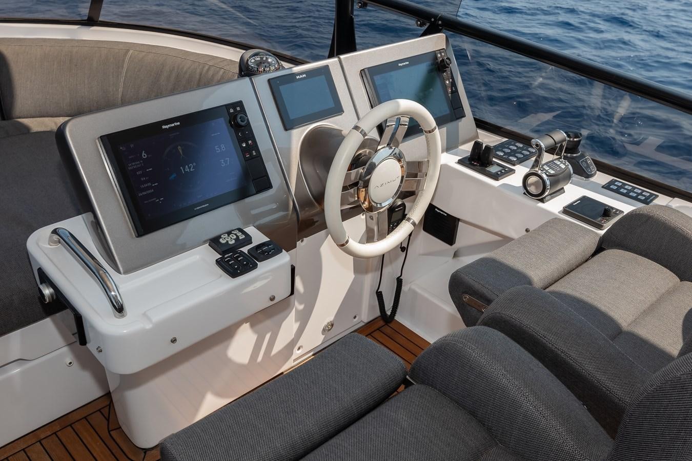 the inside of a car aboard GREY T Yacht for Sale