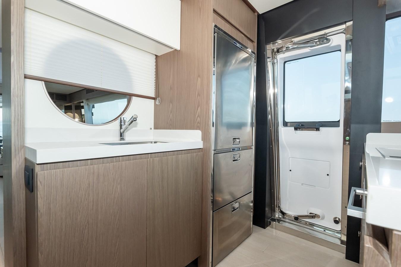 a bathroom with a shower and sink aboard GREY T Yacht for Sale