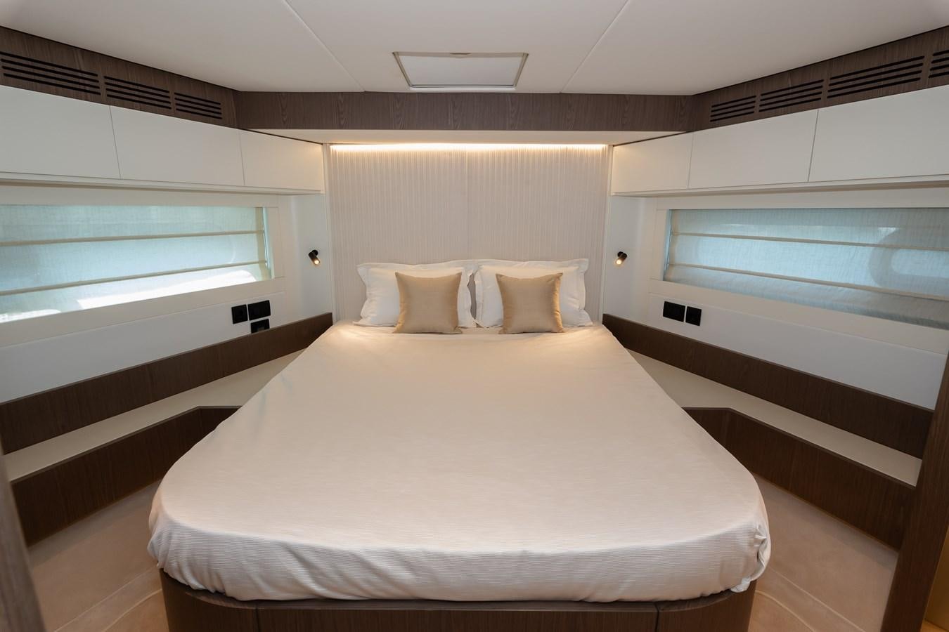 a bed in a room aboard GREY T Yacht for Sale