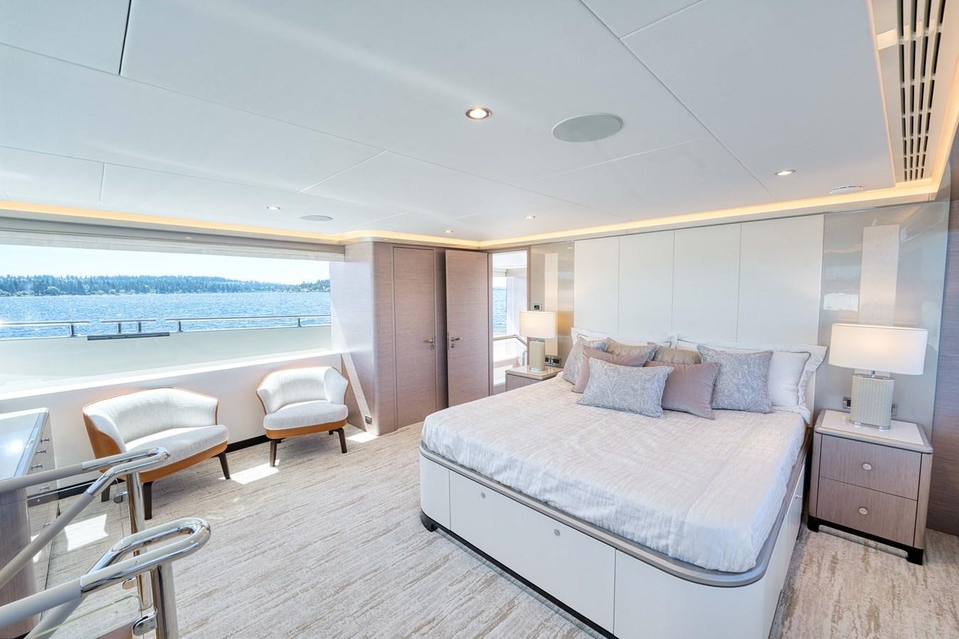 a large bedroom with a large bed aboard OCEAN ALEXANDER 32L11 Yacht for Sale