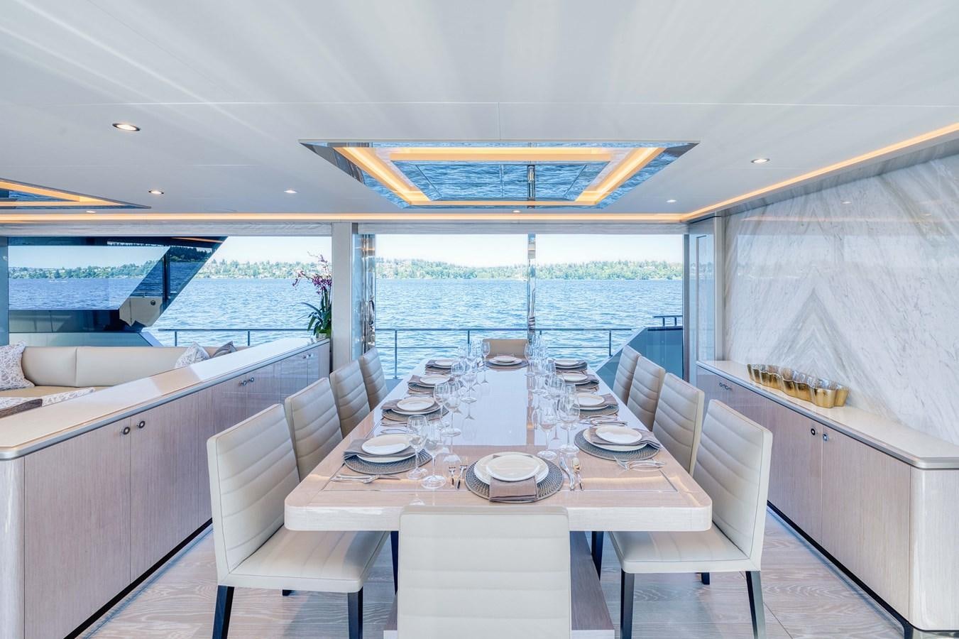 a large kitchen with a large window aboard OCEAN ALEXANDER 32L11 Yacht for Sale