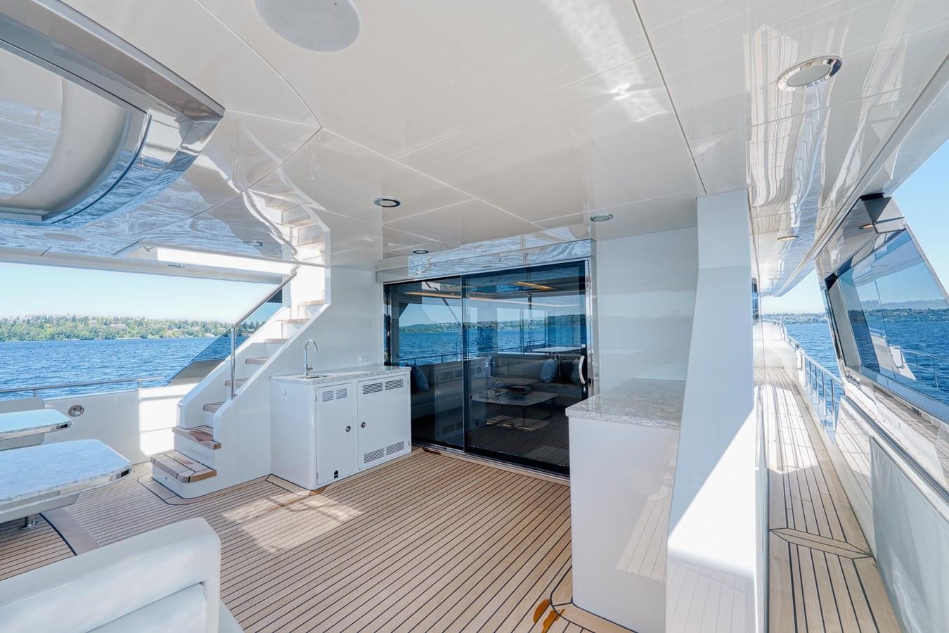 a room with a large window and a view of the water aboard OCEAN ALEXANDER 32L11 Yacht for Sale
