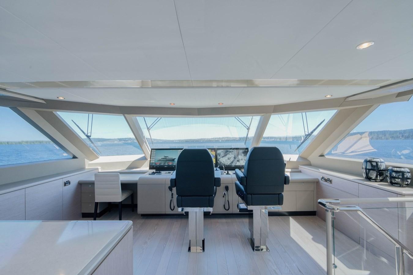 a room with a chair and a desk aboard OCEAN ALEXANDER 32L11 Yacht for Sale