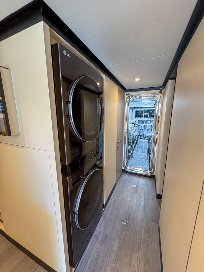 a hallway with a large mirror aboard OCEAN ALEXANDER 32L11 Yacht for Sale