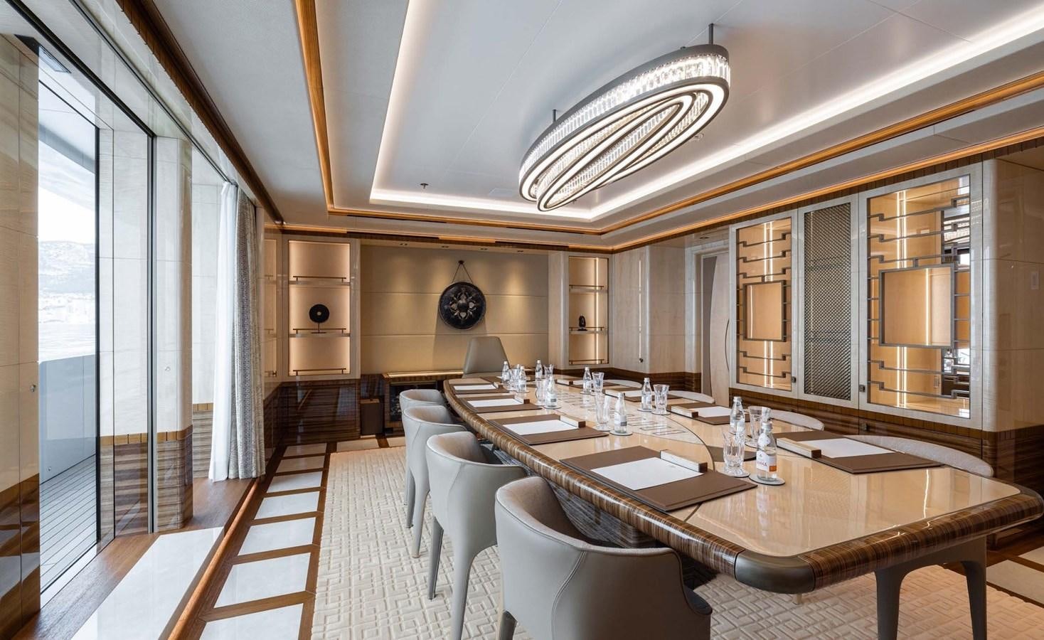 a large dining room with a large table and chairs aboard ENERGY Yacht for Sale