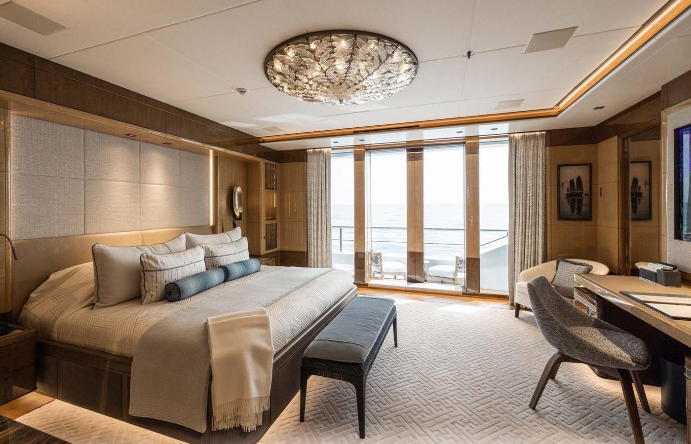 a large bedroom with a large bed aboard ENERGY Yacht for Sale