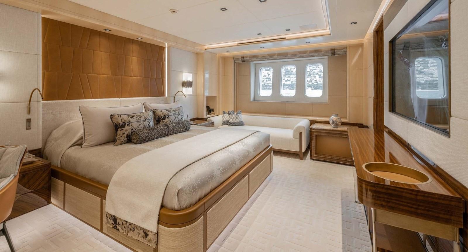 a large bedroom with a large bed aboard ENERGY Yacht for Sale