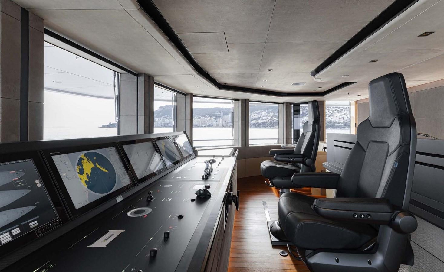 inside of a vehicle with a screen and windows aboard ENERGY Yacht for Sale