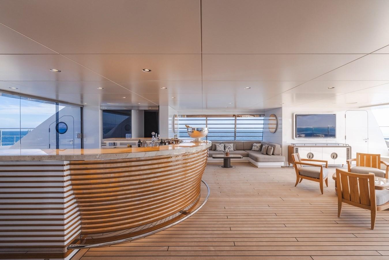 a room with a wood floor and a large window with a wood floor aboard ENERGY Yacht for Sale