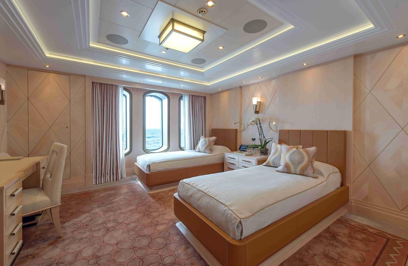 a large bedroom with a bed and a large window aboard AURORA Yacht for Sale