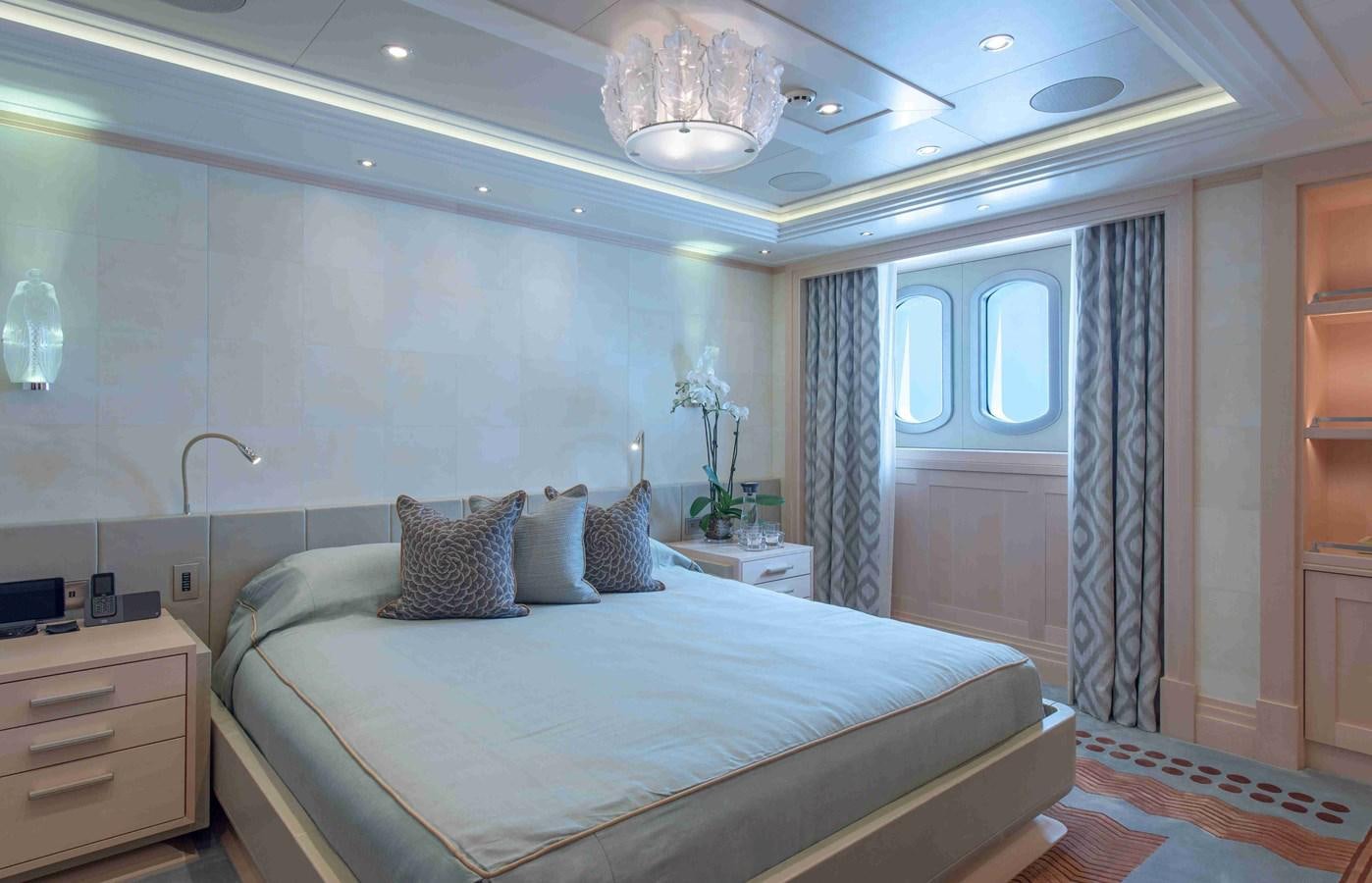 a bed in a room aboard AURORA Yacht for Sale