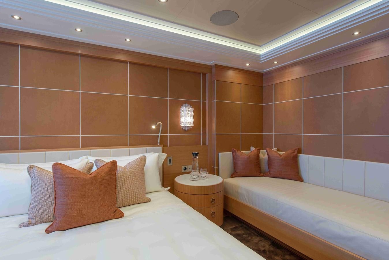 a room with two beds aboard AURORA Yacht for Sale