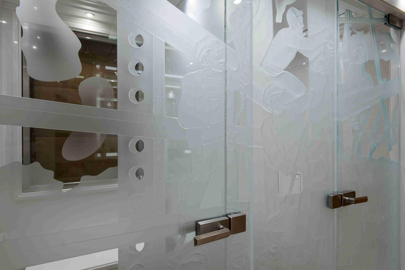 a bathroom with a shower aboard AURORA Yacht for Sale