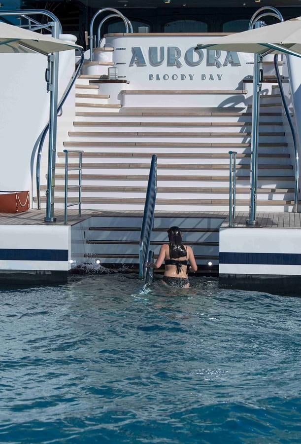 a person in a bikini in a pool aboard AURORA Yacht for Sale