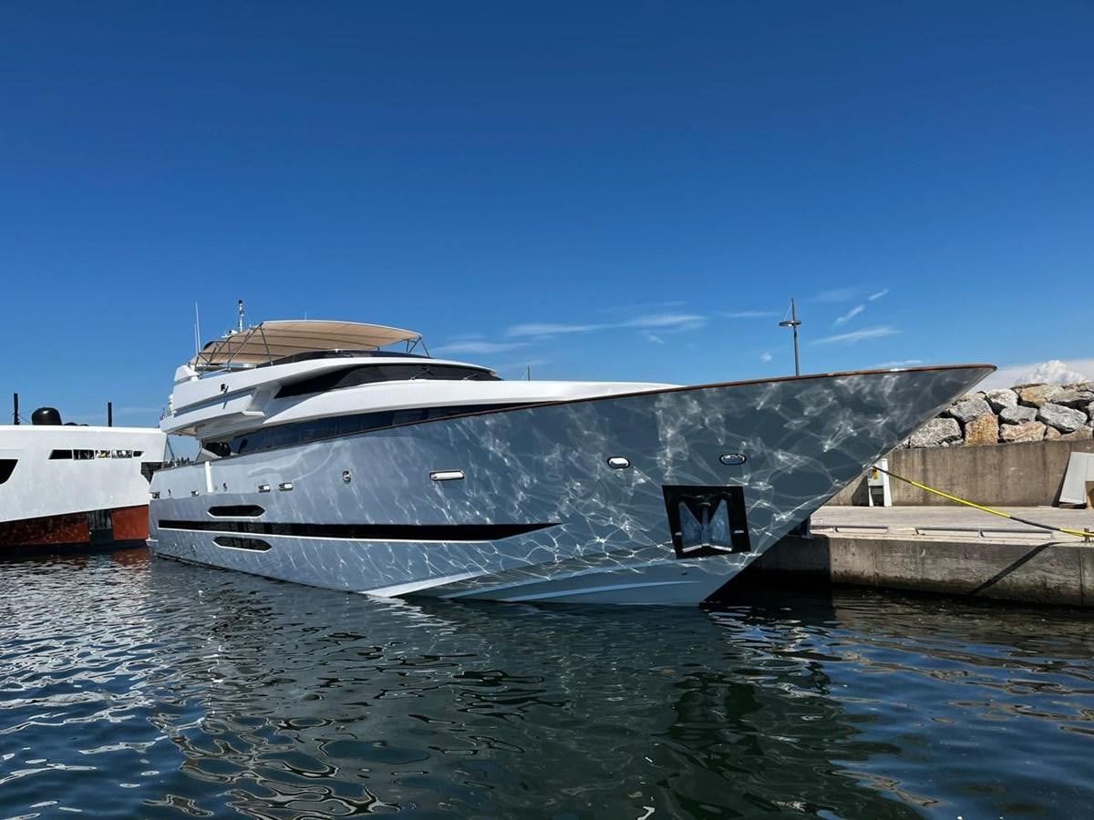 a boat docked at a dock aboard BLUEY Yacht for Sale