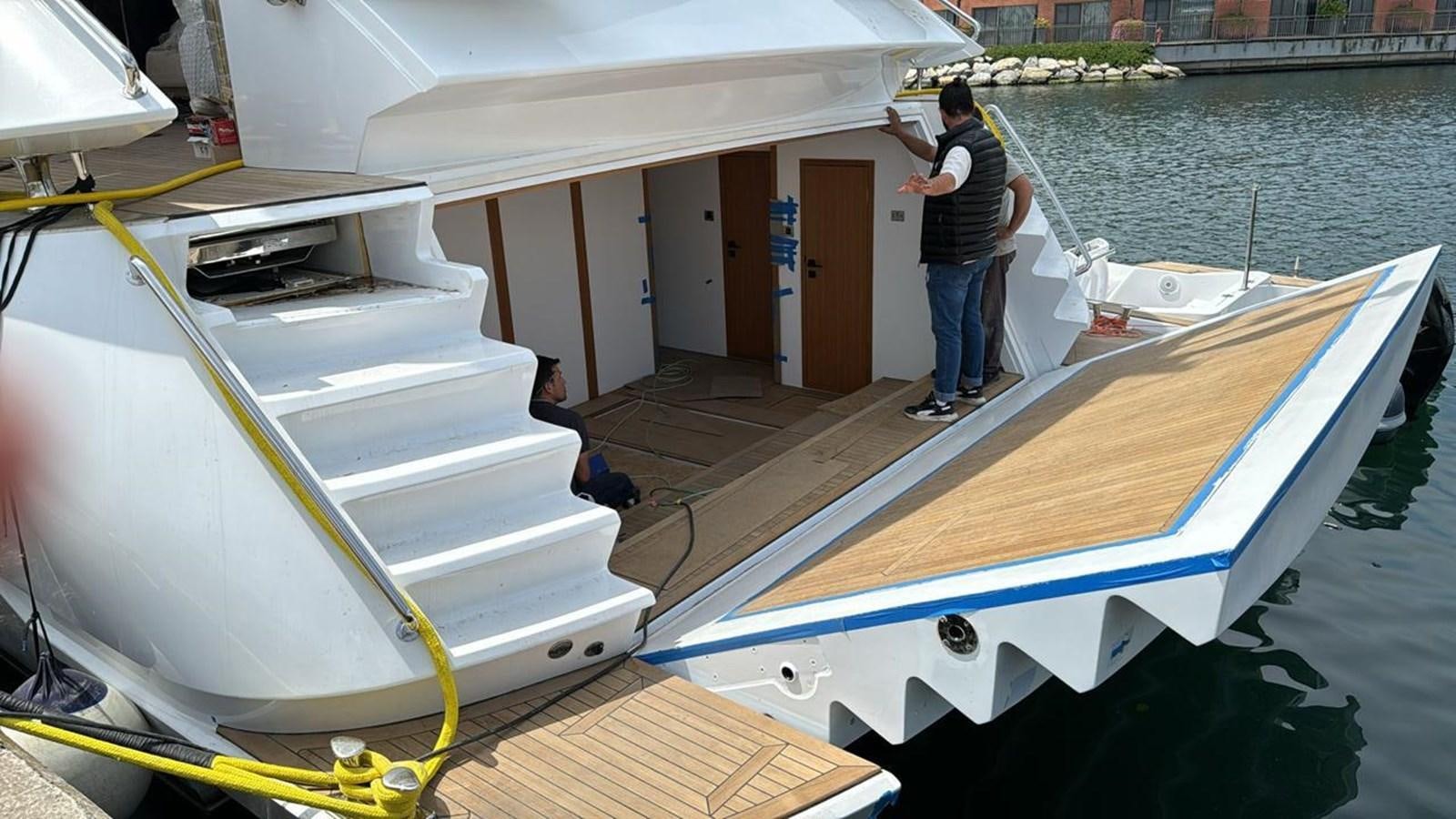 a person standing on a boat aboard BLUEY Yacht for Sale