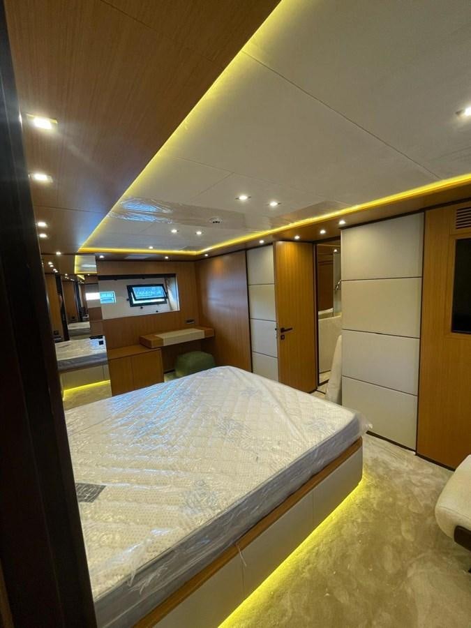 a hotel room with a bed aboard BLUEY Yacht for Sale