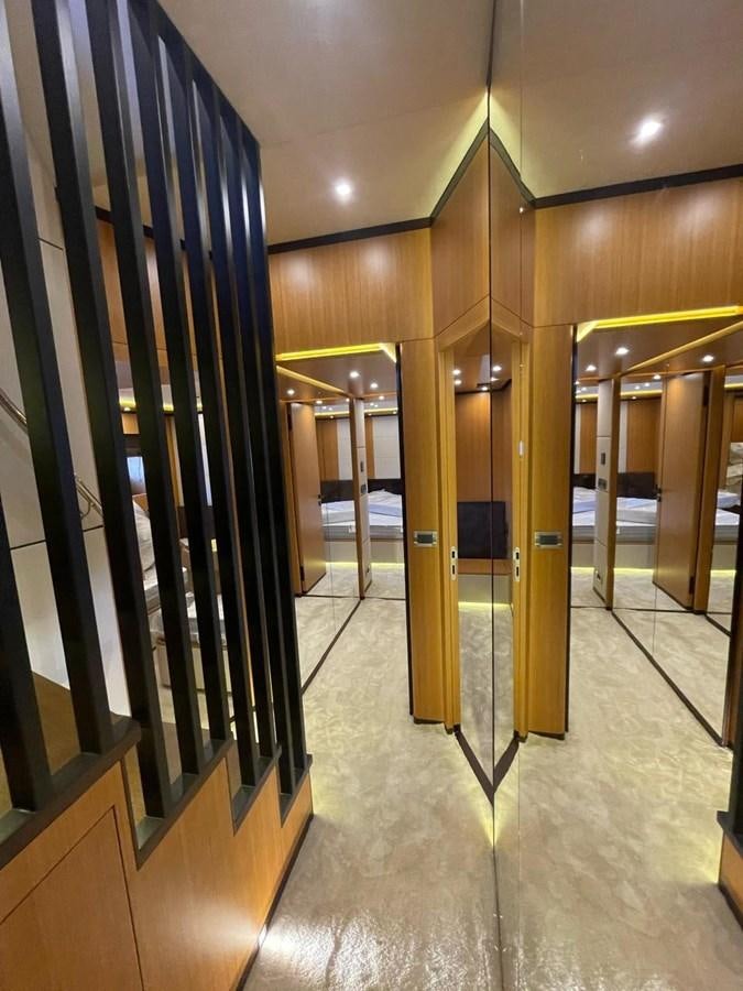 a hallway with glass doors aboard BLUEY Yacht for Sale
