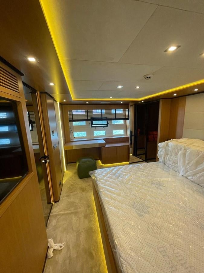 a hotel room with a bed aboard BLUEY Yacht for Sale