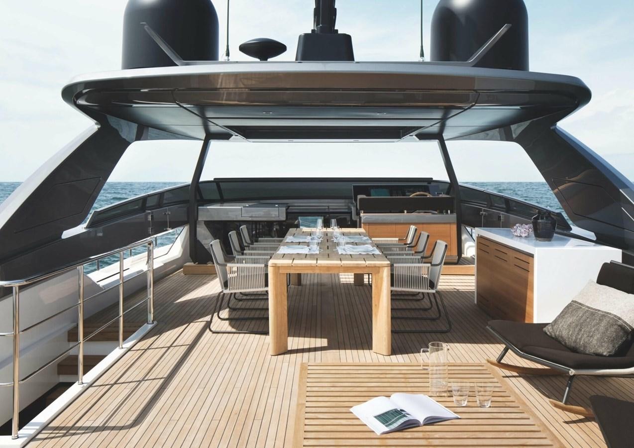 a room with a table and chairs aboard ASYMMETRIC Yacht for Sale