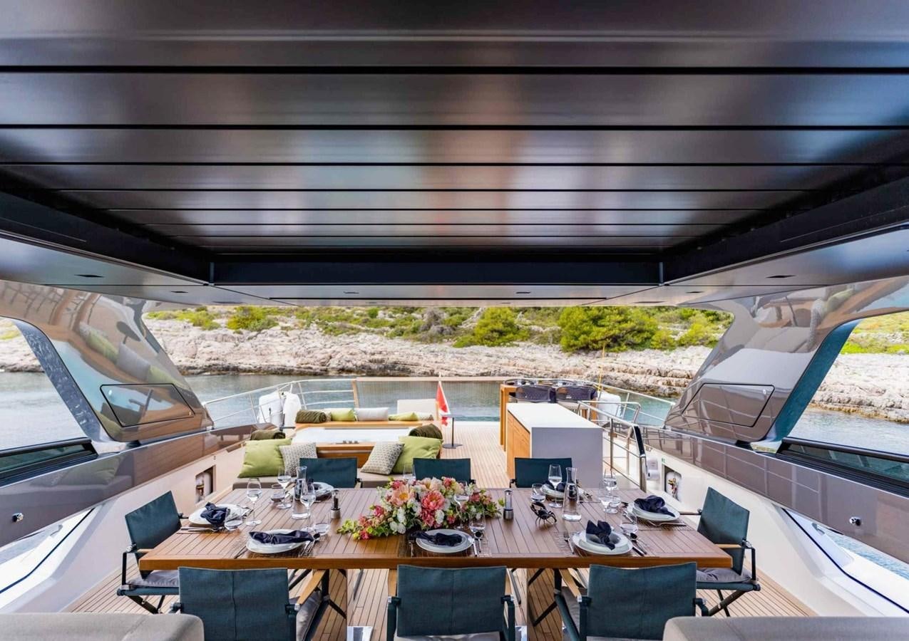 a room with a table and chairs aboard ASYMMETRIC Yacht for Sale