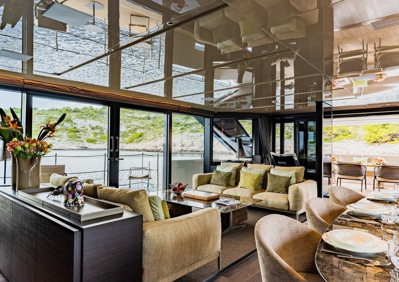 a living room with a large window aboard ASYMMETRIC Yacht for Sale