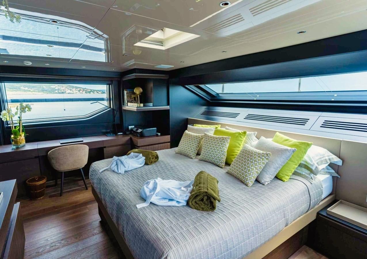 a bed with pillows on it aboard ASYMMETRIC Yacht for Sale