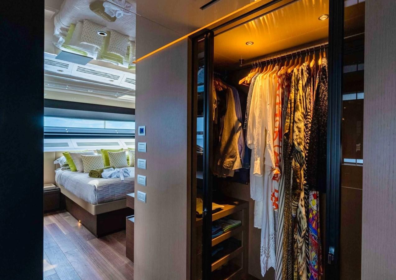 a bedroom with a closet aboard ASYMMETRIC Yacht for Sale