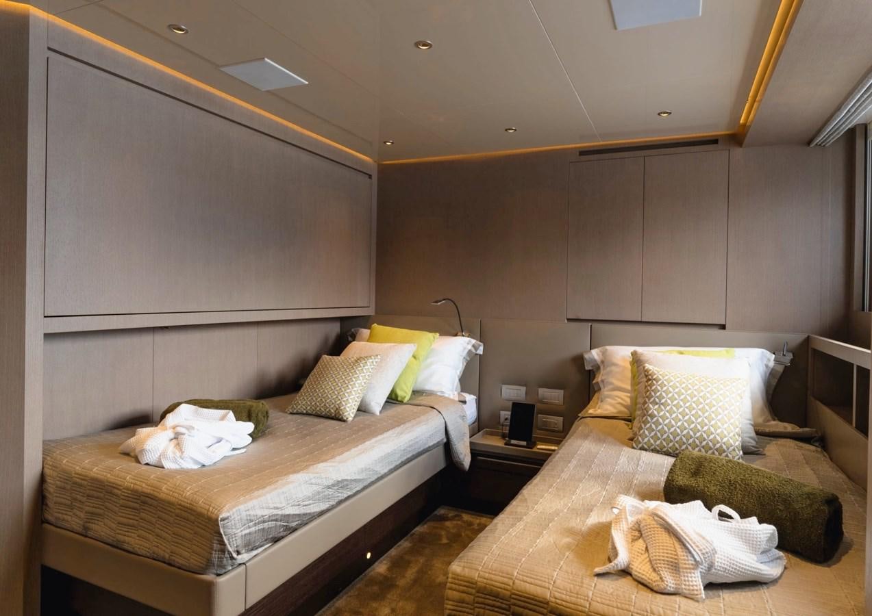 a couple of beds in a hotel room aboard ASYMMETRIC Yacht for Sale