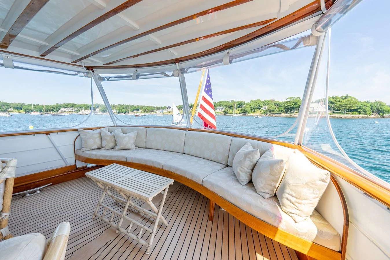 a boat with a flag on the front aboard BERNADETTE Yacht for Sale