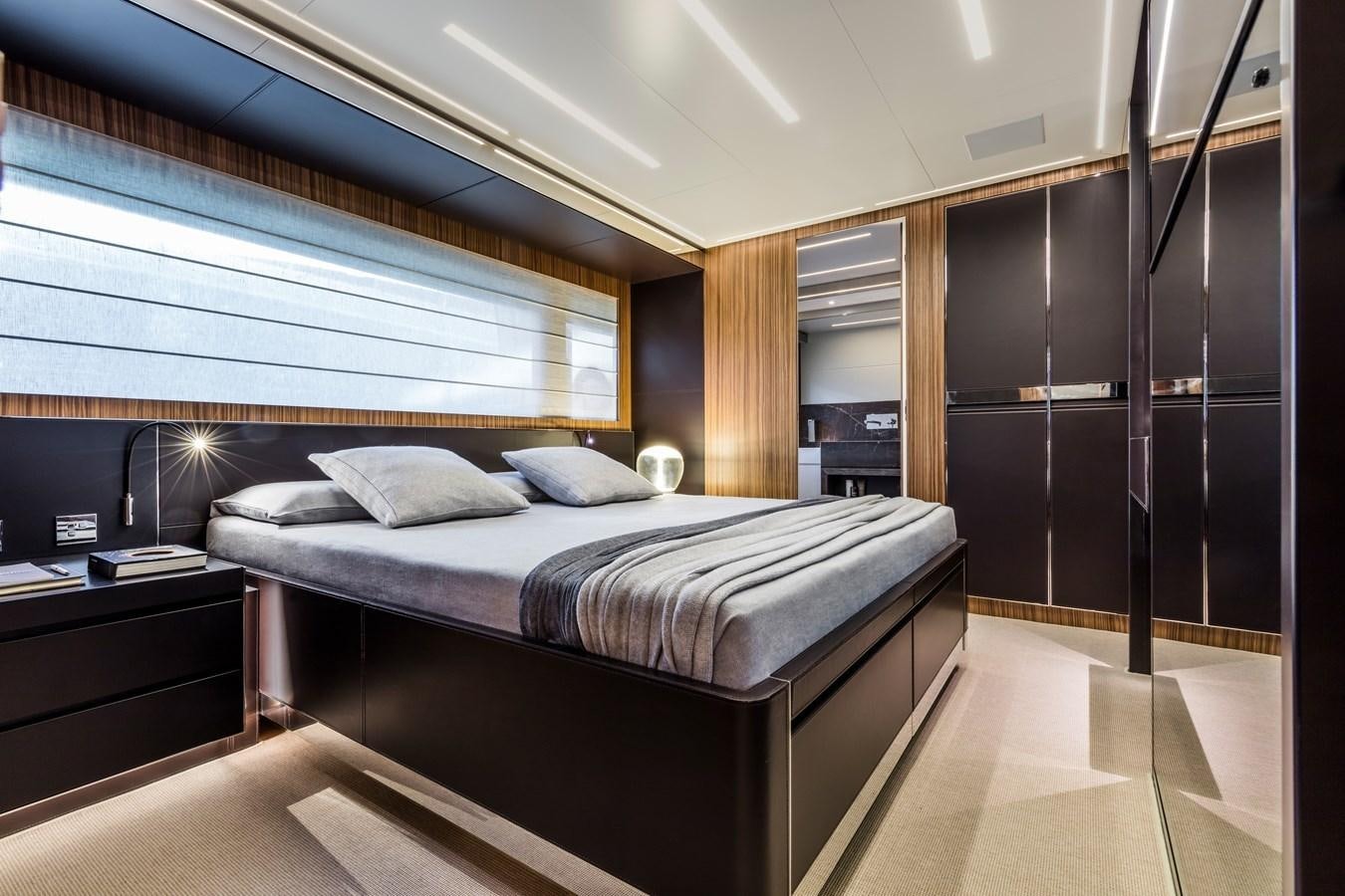 a bed in a room aboard IRON GRYPHON Yacht for Sale