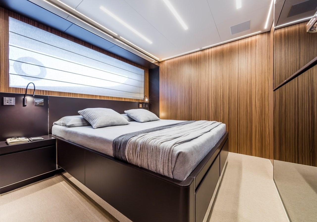 a room with two beds aboard IRON GRYPHON Yacht for Sale