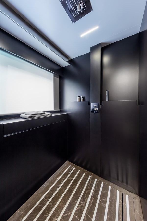 a room with a large window and a tile floor aboard IRON GRYPHON Yacht for Sale