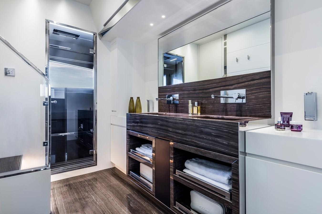 a room with a glass door aboard IRON GRYPHON Yacht for Sale