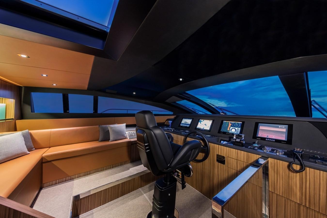a room with a couch and a tv aboard IRON GRYPHON Yacht for Sale
