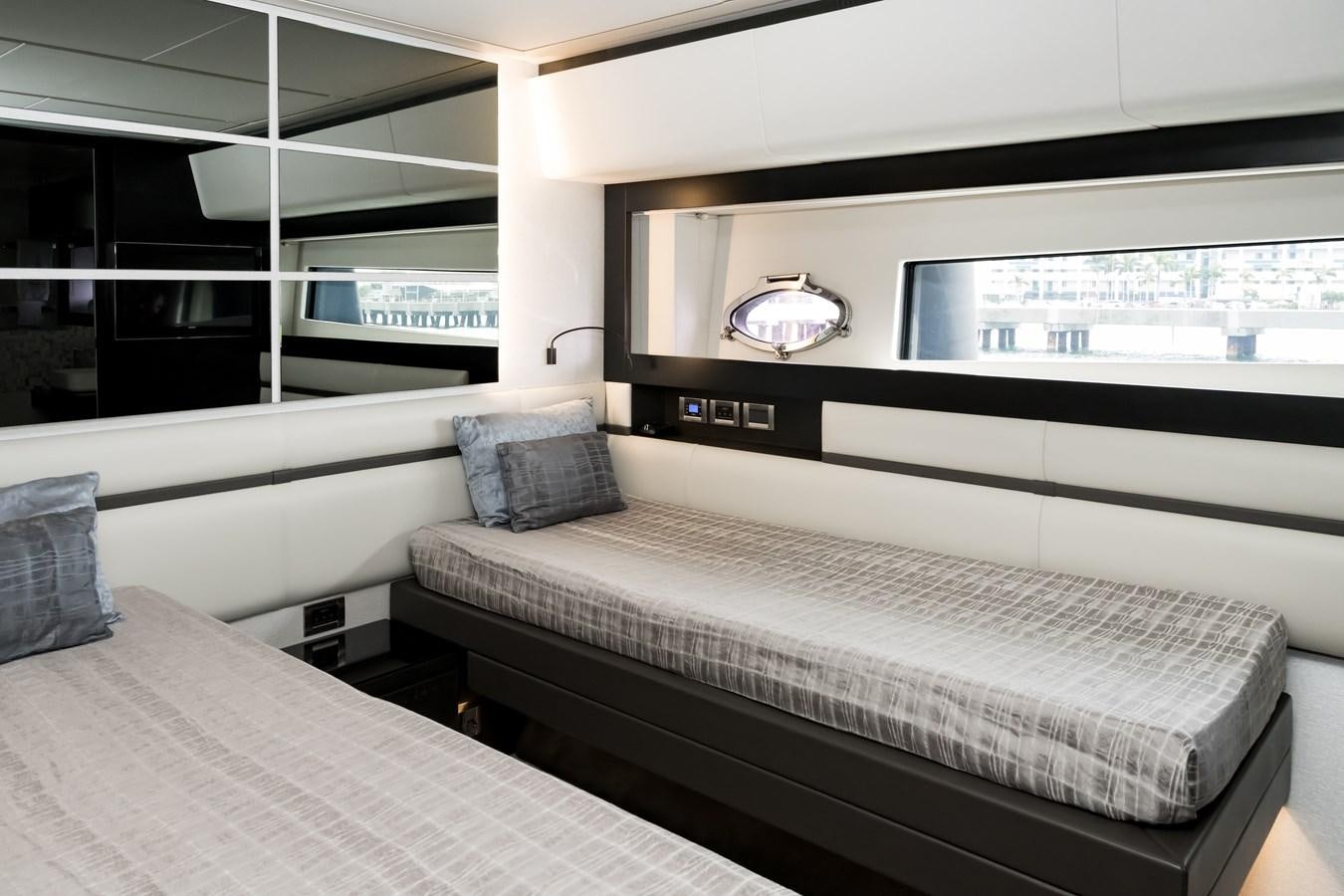 a room with two beds aboard QUEEN B SPORT Yacht for Sale