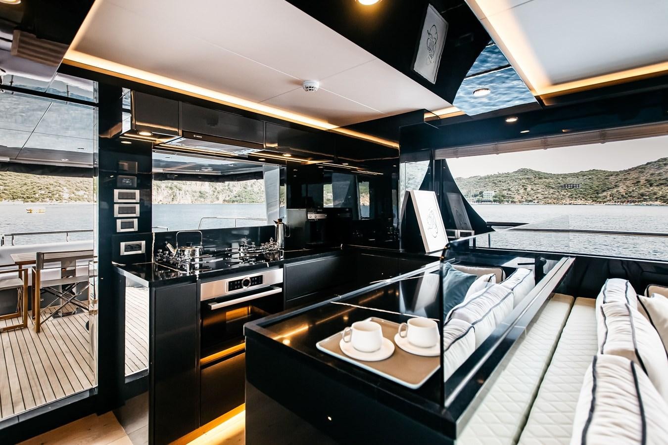 a kitchen with a large oven aboard BERING 70 LEVANNA Yacht for Sale